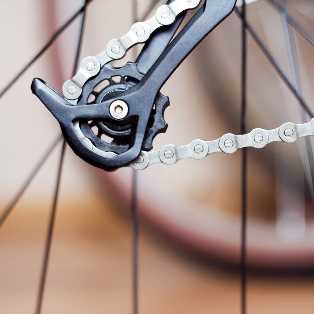 how to tighten a bike chain with a derailleur